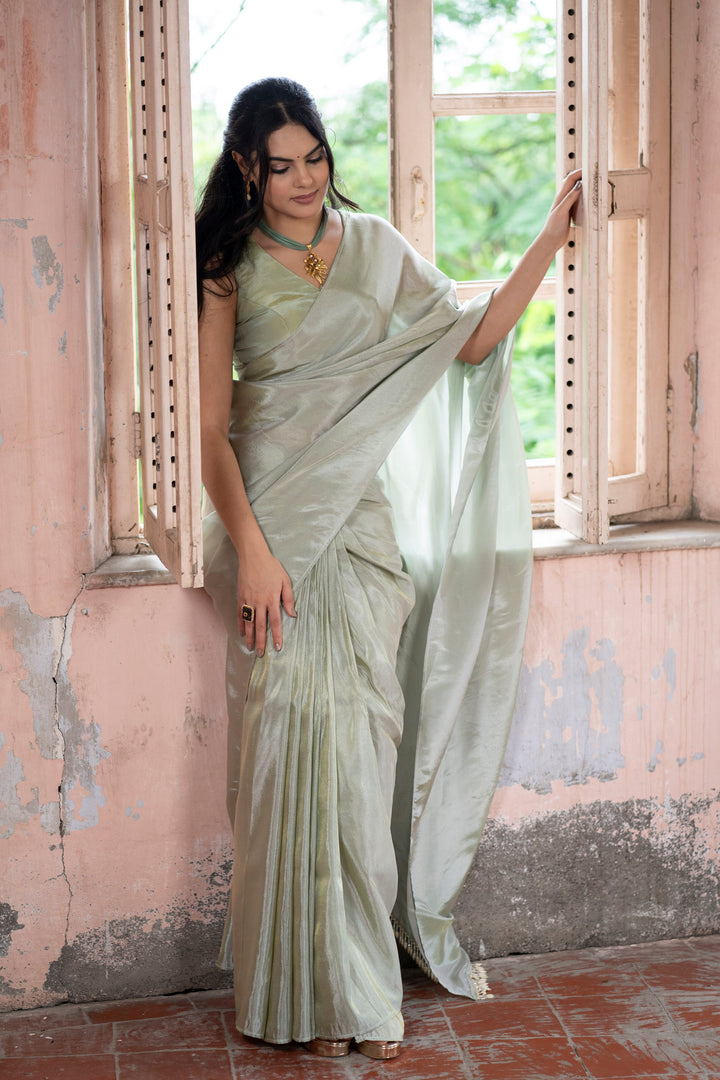 Sophisticated Green Plain Tissue Silk Saree