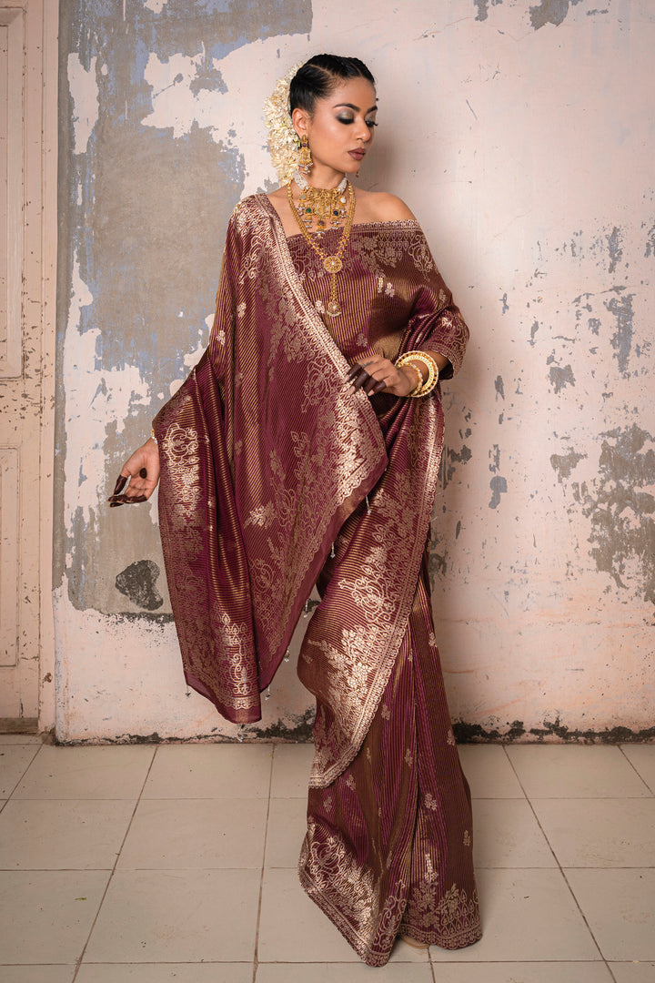 Tissue Maroon Taby Saree with Jari Lining, Small Flower Buttis, and Handmade Tassels