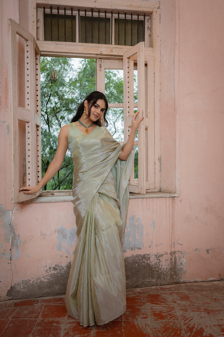 Sophisticated Green Plain Tissue Silk Saree