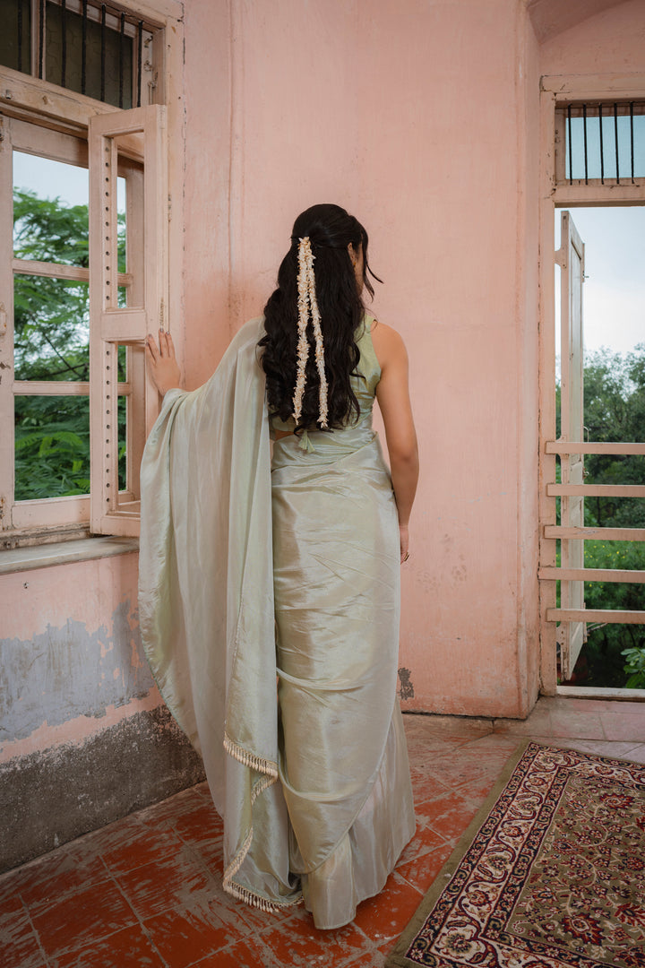 Sophisticated Green Plain Tissue Silk Saree