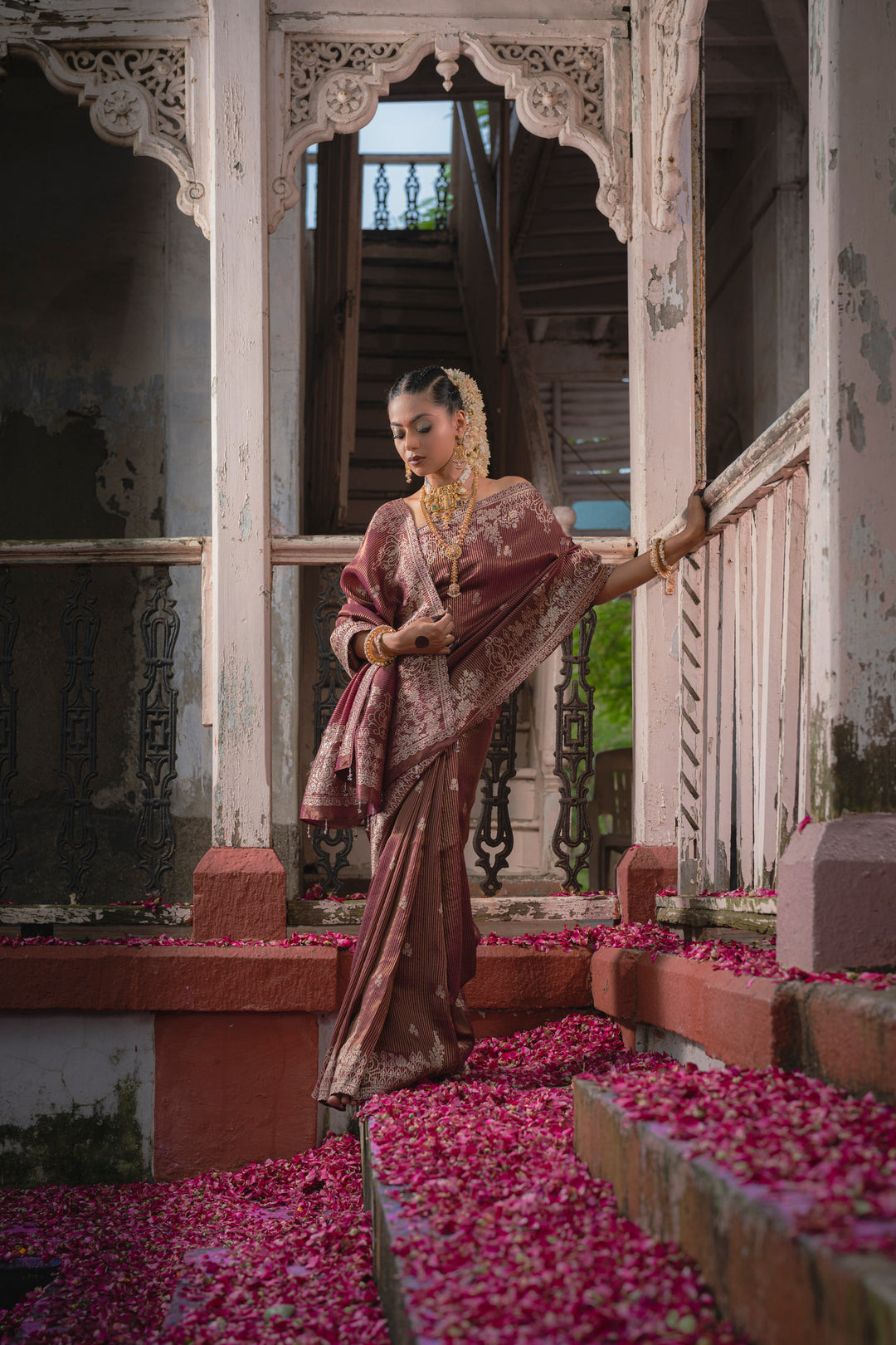 Tissue Maroon Taby Saree with Jari Lining, Small Flower Buttis, and Handmade Tassels