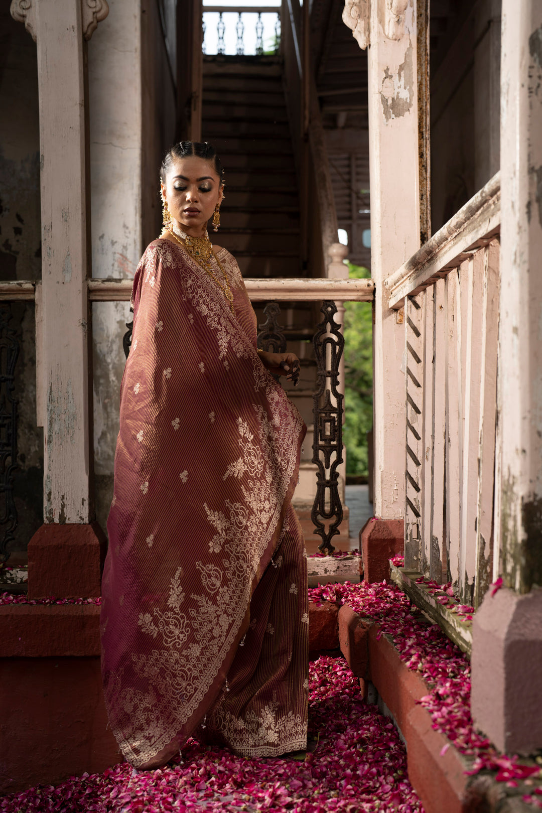 Tissue Maroon Taby Saree with Jari Lining, Small Flower Buttis, and Handmade Tassels