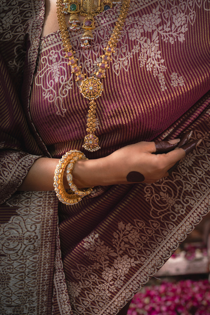 Tissue Maroon Taby Saree with Jari Lining, Small Flower Buttis, and Handmade Tassels