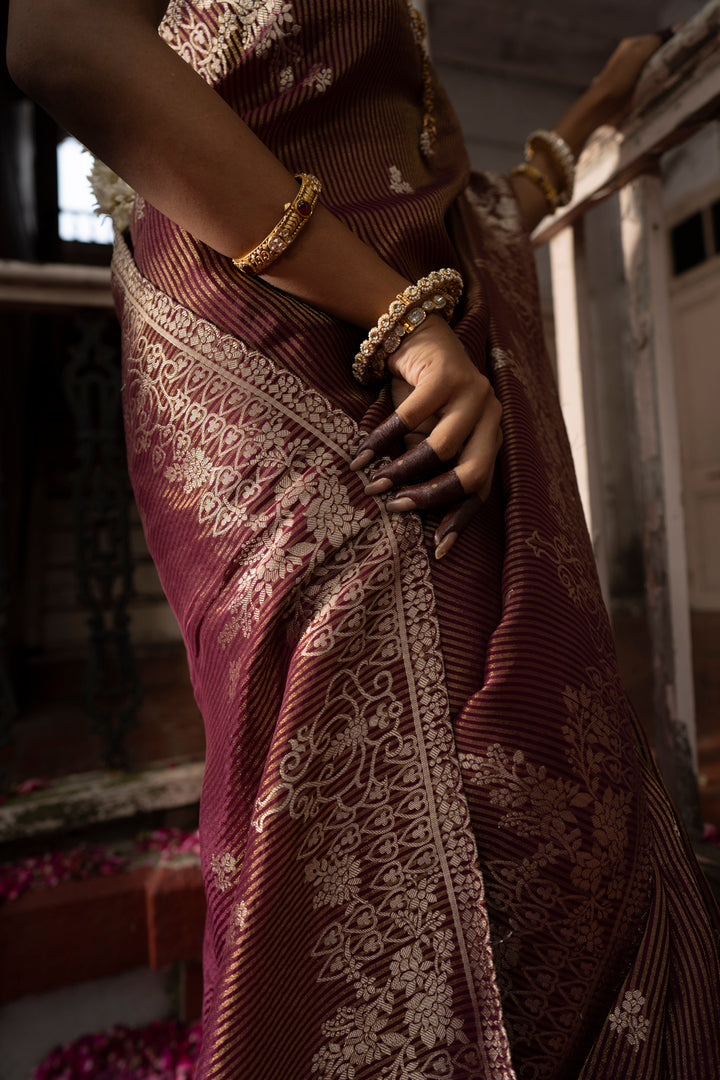 Tissue Maroon Taby Saree with Jari Lining, Small Flower Buttis, and Handmade Tassels